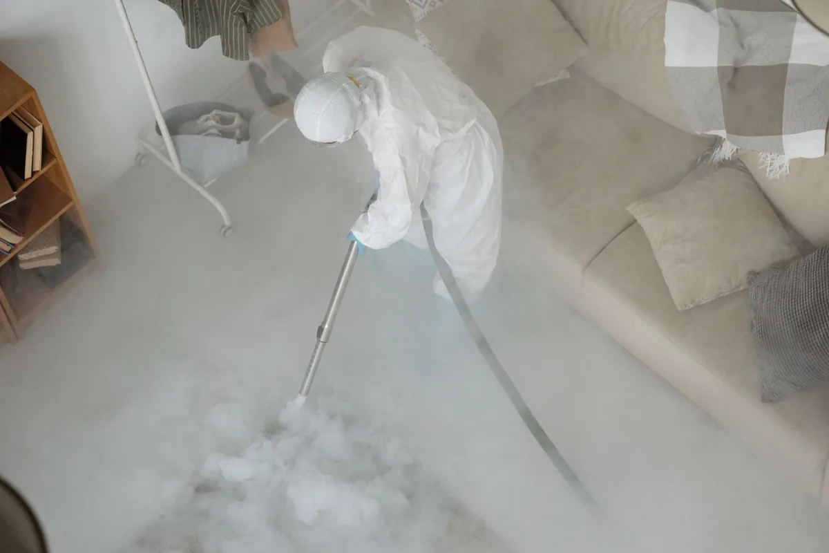 Biohazard cleanup technician in protective equipment, Bridgeport, PA
